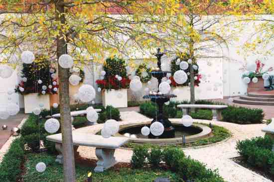 Better Homes and Gardens decorated the Blair House garden with ethereal floating ornaments.